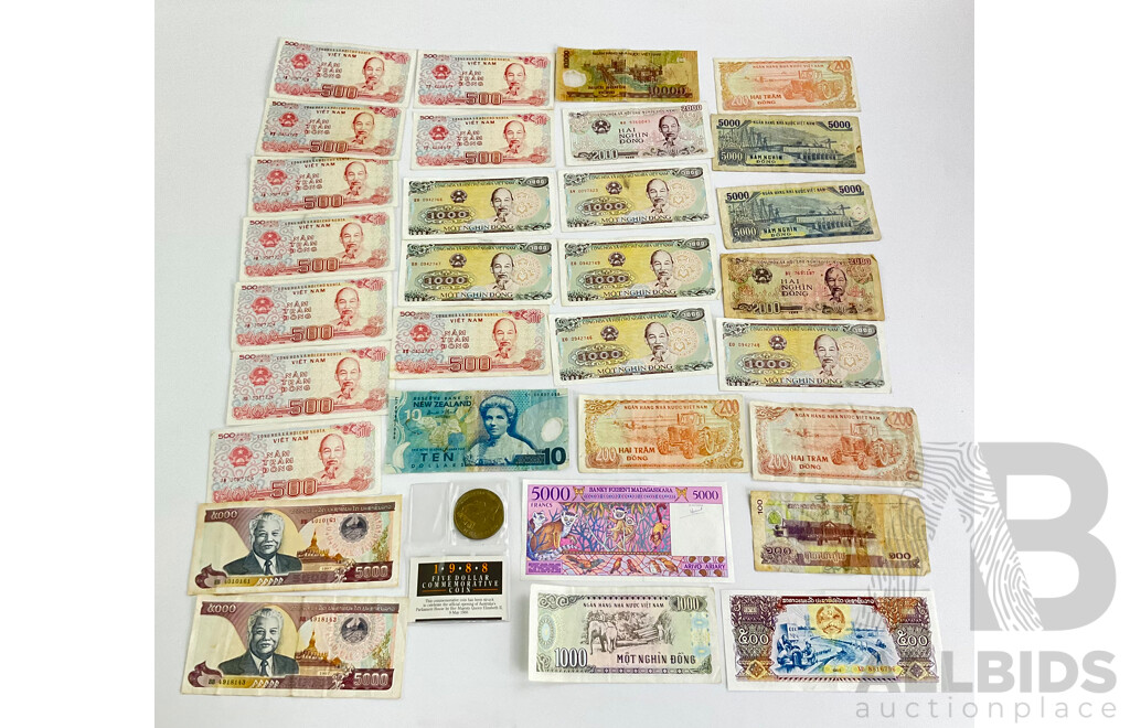 Australian 1988 Commemorative Five Dollar Coin, New Zealand Ten Dollar Note with Vietnam, Madagascar and Laos Bank Notes