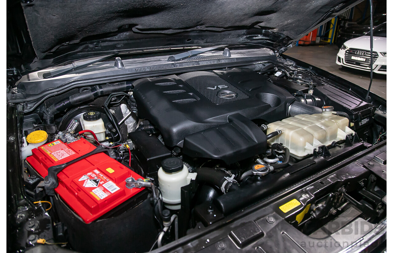 1/2012 Nissan Navara ST-X 550 (4x4) D40 MY12 Dual Cab Utility Black Turbo Diesel V6 3.0L