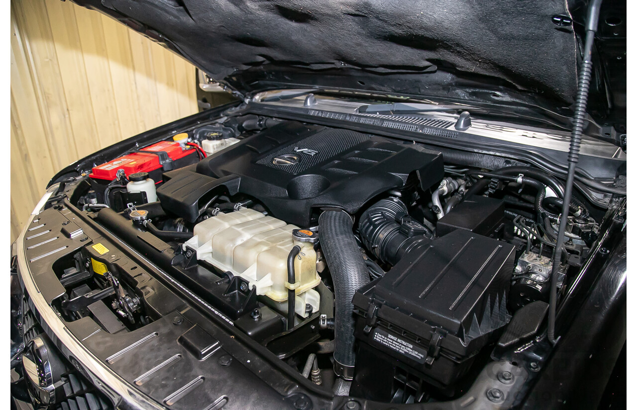 1/2012 Nissan Navara ST-X 550 (4x4) D40 MY12 Dual Cab Utility Black Turbo Diesel V6 3.0L