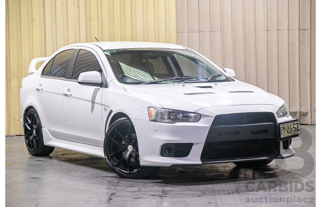 8/2010 Mitsubishi Lancer Ralliart (AWD) CJ MY10 4d Sedan White Turbo 2.0L