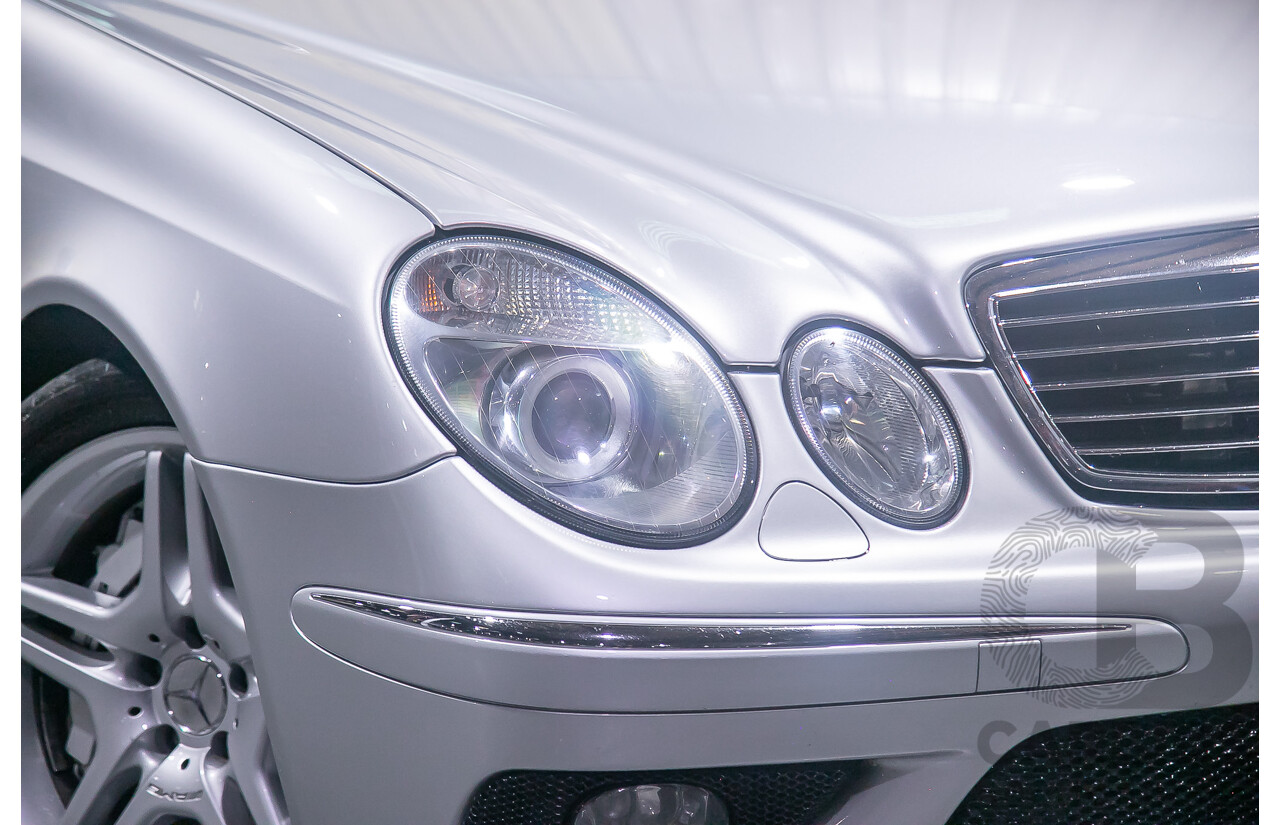 10/2004 Mercedes Benz E55 AMG W211 4d Sedan Brilliant Silver Metallic Supercharged V8 5.4L
