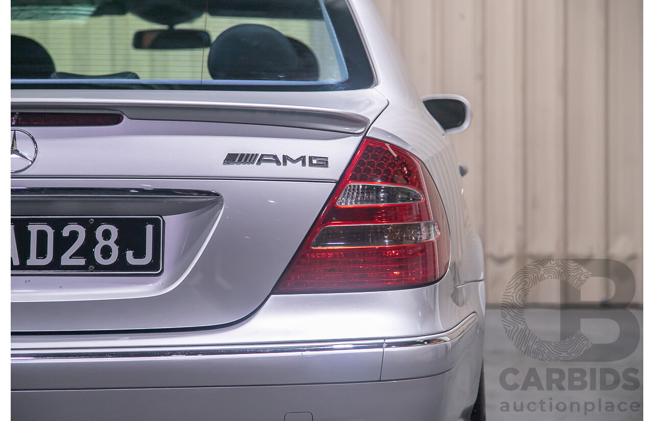 10/2004 Mercedes Benz E55 AMG W211 4d Sedan Brilliant Silver Metallic Supercharged V8 5.4L