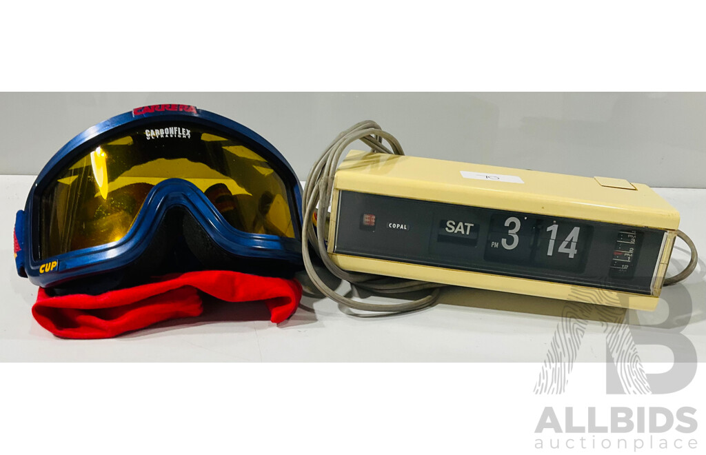 Vintage Carrera Snow Goggles in Cloth Bag Alongside Vintage Copal Flip Digital Clock