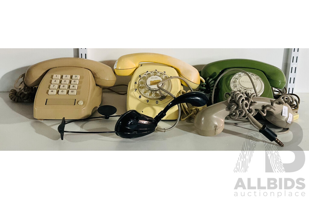 Trio of Vintage Telephones Alongside Two Diverse Plug in Ear Pieces