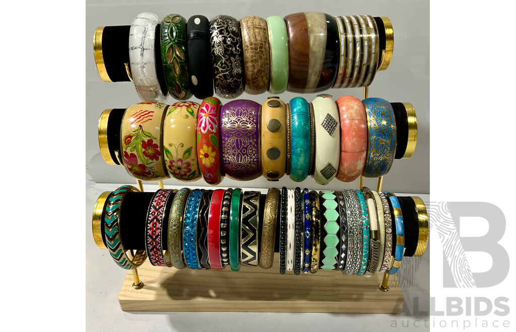 Wonderful Collection of 40 Bangles on a Three Tiered Bangle Display Stand