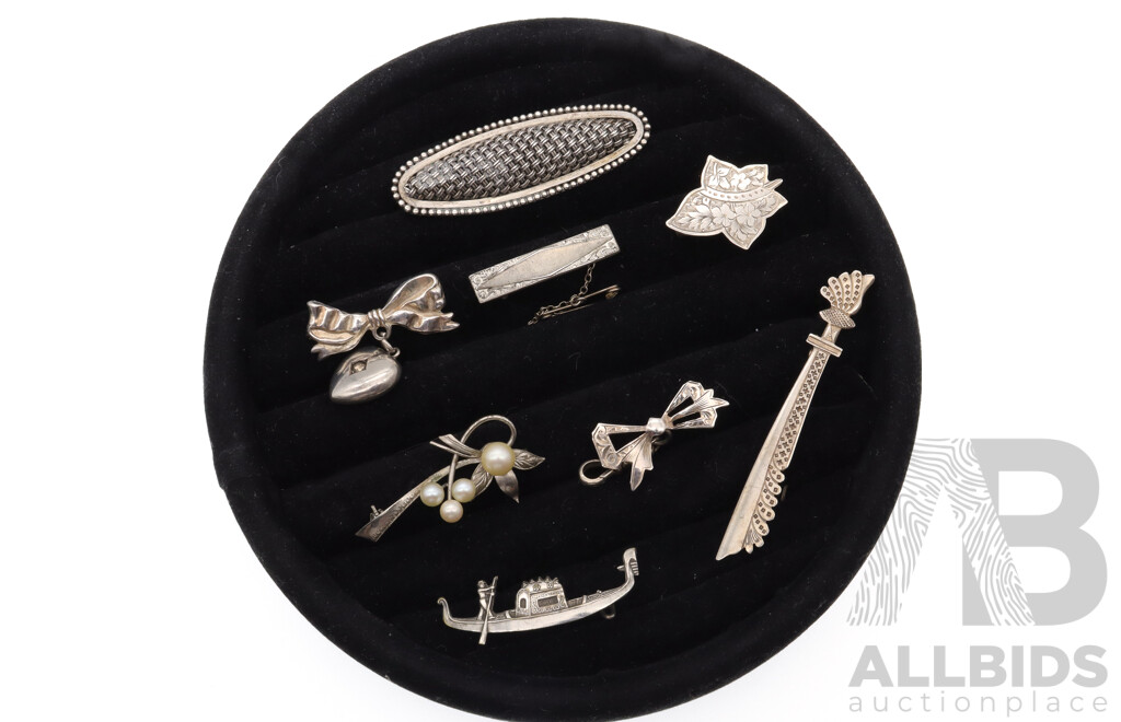 Sterling Silver Vintage (8) Brooch Collection, 38.64 Grams, on Black Velvet Brooch Display