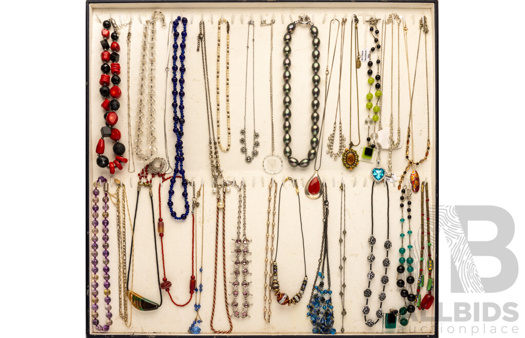 Collection of (32) Vintage Necklaces in Various Designs on Display Mount