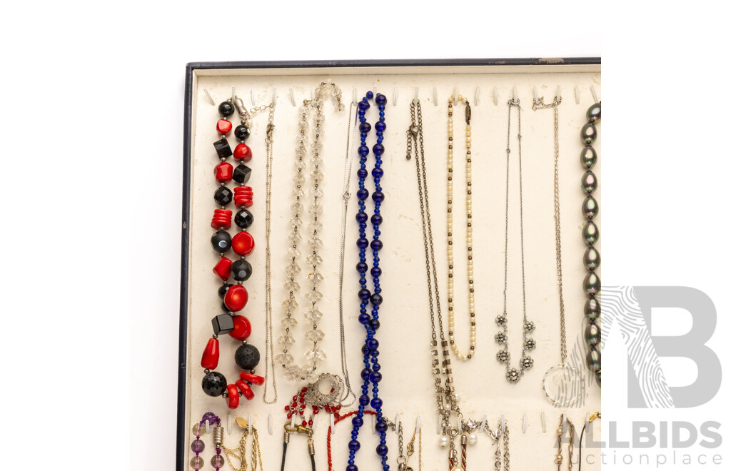 Collection of (32) Vintage Necklaces in Various Designs on Display Mount