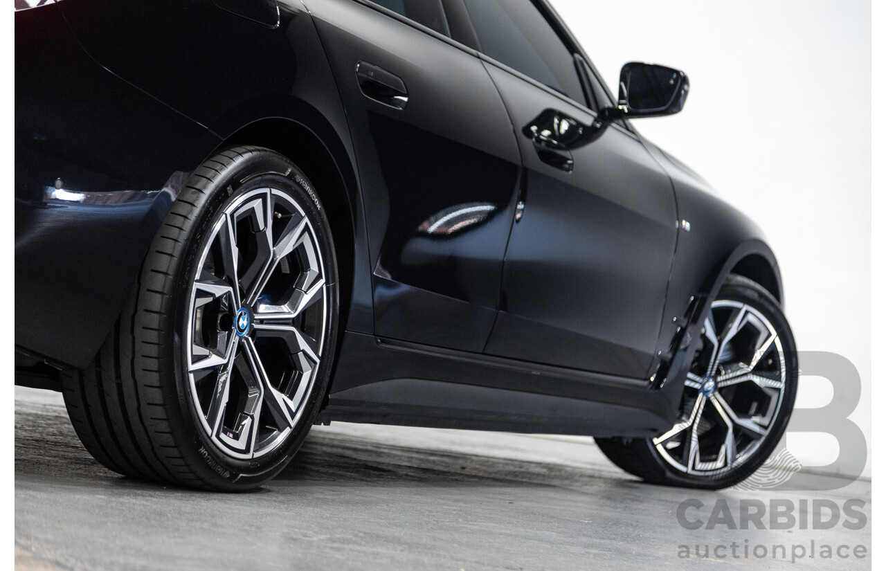 05/2022 BMW i4 eDrive40i M-Sport Gran Coupe G26 4D Coupe Black Sapphire Metallic Electric EV 250kw