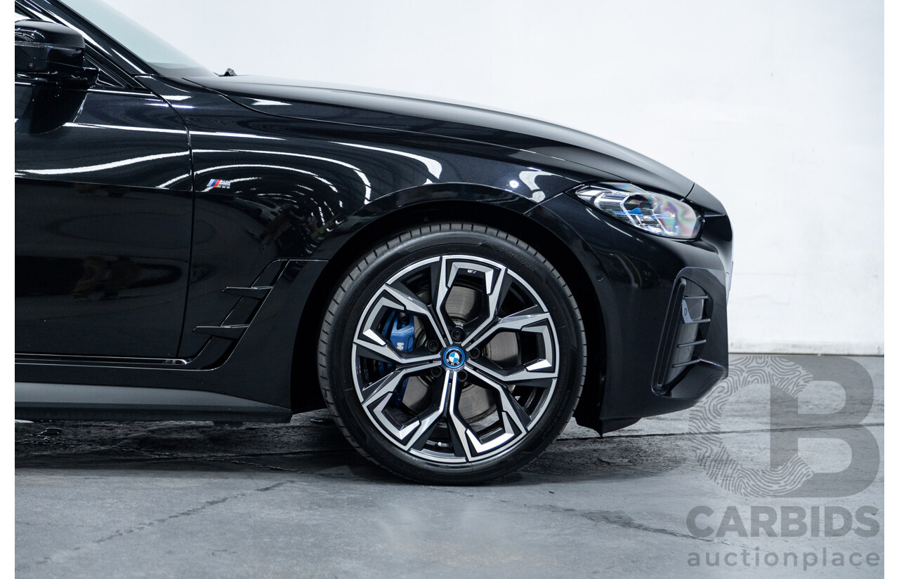05/2022 BMW i4 eDrive40i M-Sport Gran Coupe G26 4D Coupe Black Sapphire Metallic Electric EV 250kw