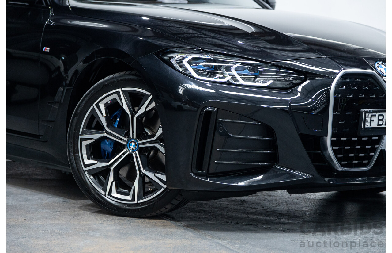 05/2022 BMW i4 eDrive40i M-Sport Gran Coupe G26 4D Coupe Black Sapphire Metallic Electric EV 250kw
