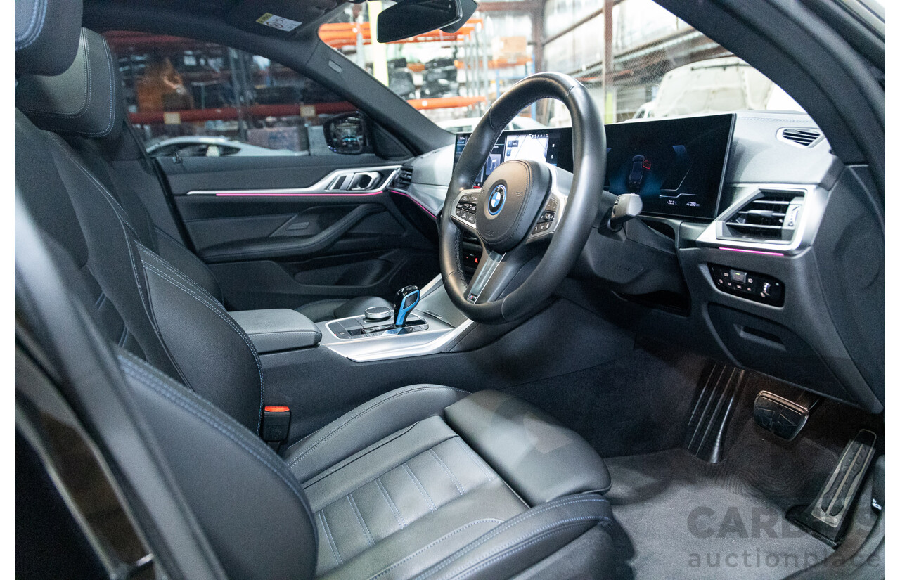 05/2022 BMW i4 eDrive40i M-Sport Gran Coupe G26 4D Coupe Black Sapphire Metallic Electric EV 250kw