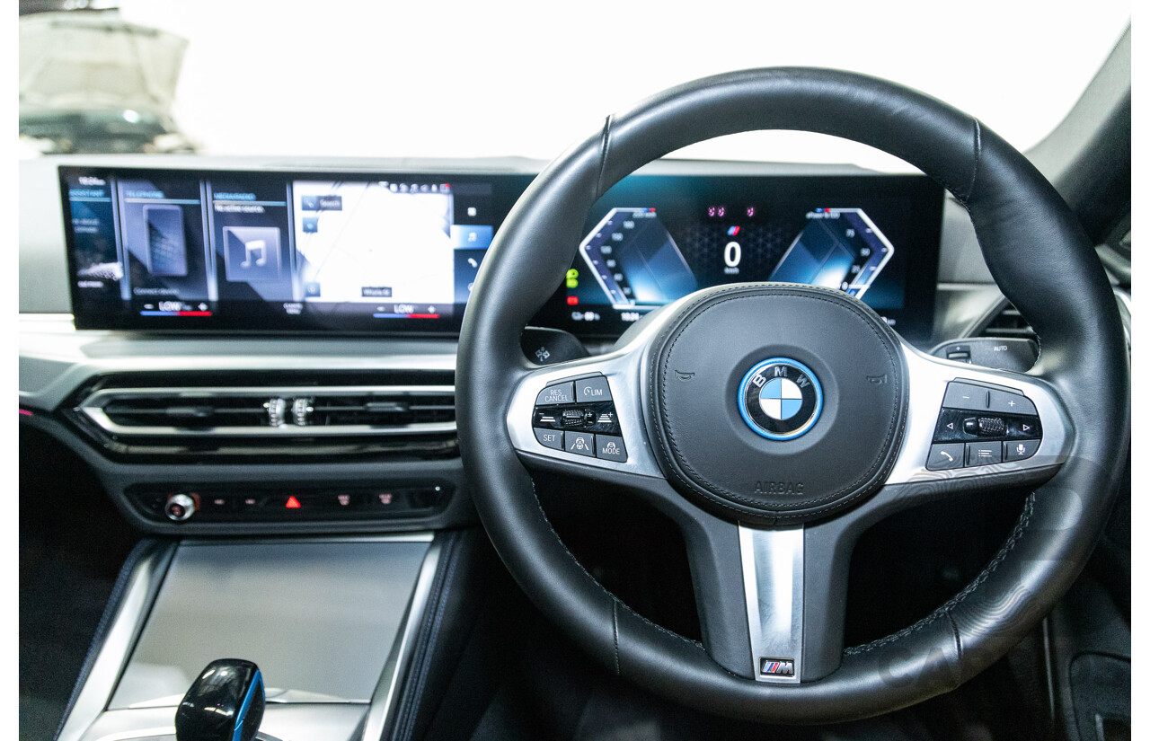 05/2022 BMW i4 eDrive40i M-Sport Gran Coupe G26 4D Coupe Black Sapphire Metallic Electric EV 250kw