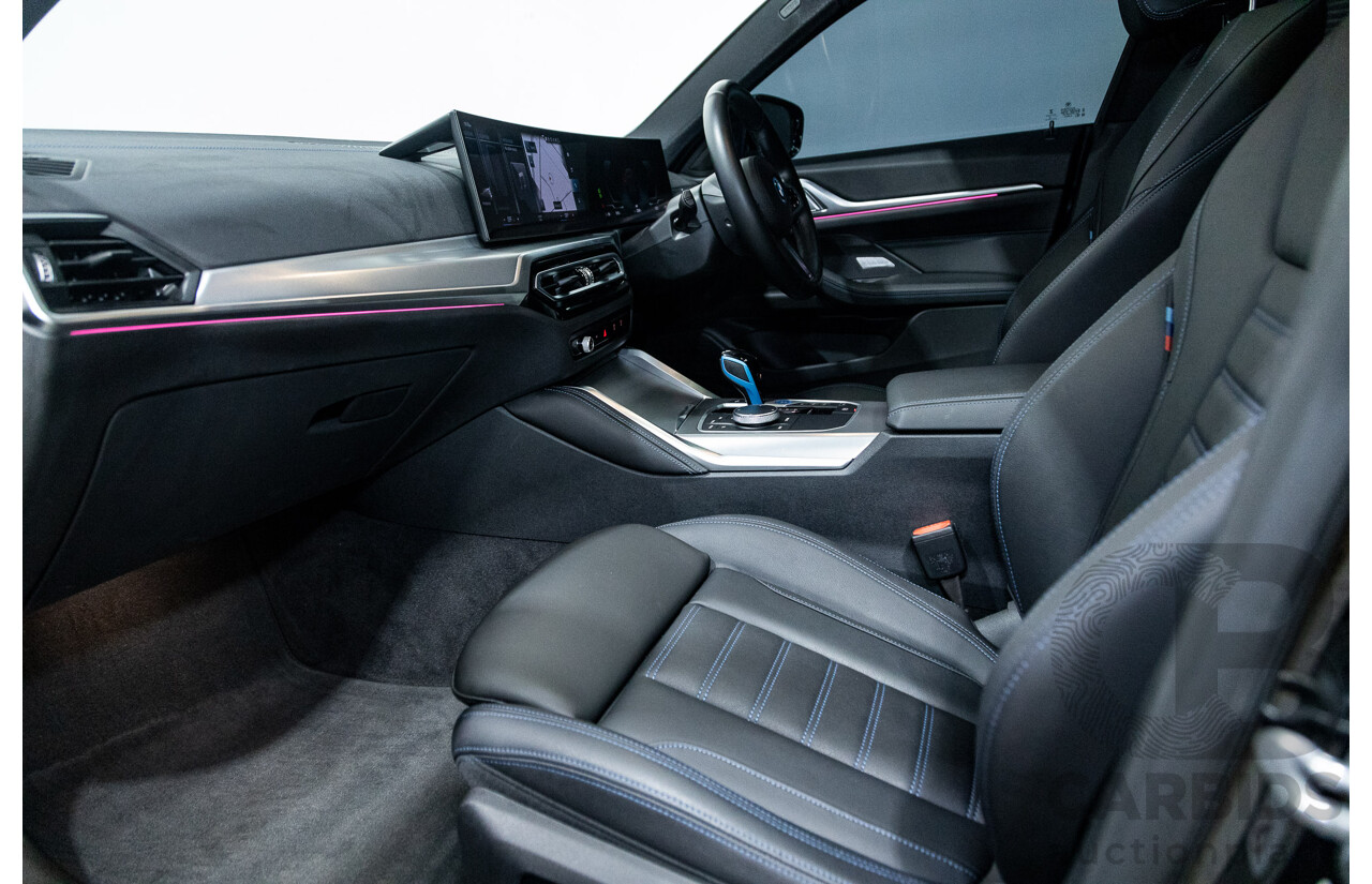 05/2022 BMW i4 eDrive40i M-Sport Gran Coupe G26 4D Coupe Black Sapphire Metallic Electric EV 250kw