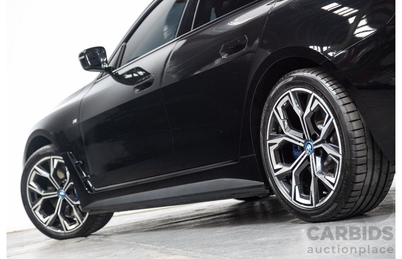 05/2022 BMW i4 eDrive40i M-Sport Gran Coupe G26 4D Coupe Black Sapphire Metallic Electric EV 250kw