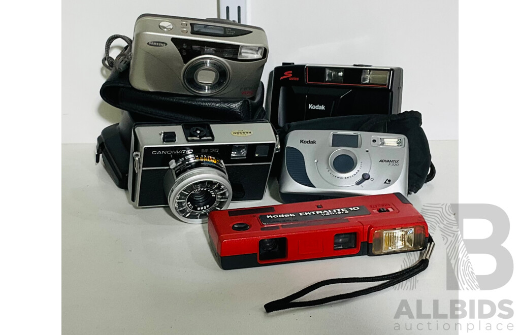 Collection of Five Automatic Cameras, Including Kodak S 100 EF, Canon M70 Canomatic and More - All with Cases Aside From Kodak Ektralite 10