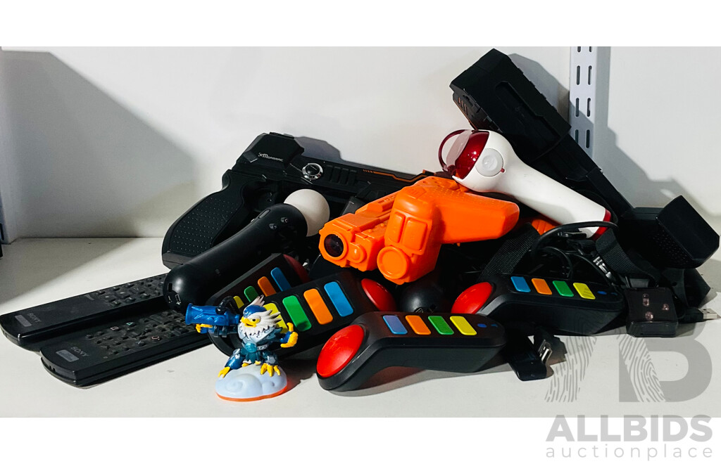 Large Collection of Gaming Controls Including Buzz!, Sony, PlayStation Move and More