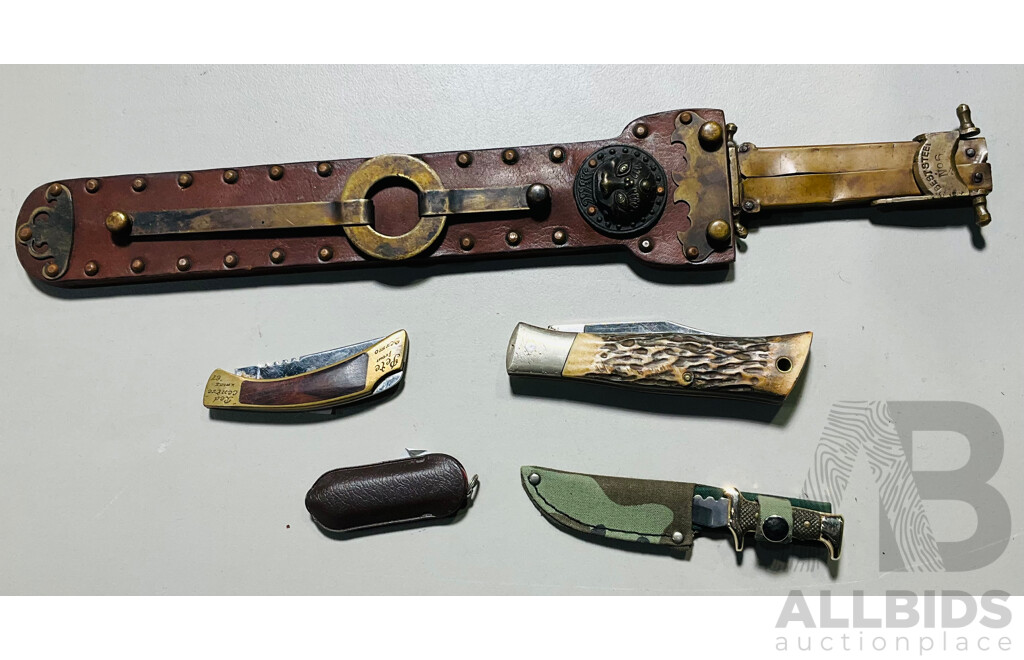 Collection of Four Smaller Varied Pocket Knives Alongside a Knife in a Decorative Leather Scabbard