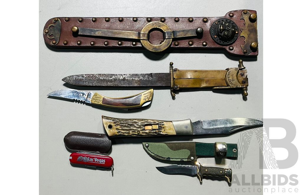 Collection of Four Smaller Varied Pocket Knives Alongside a Knife in a Decorative Leather Scabbard
