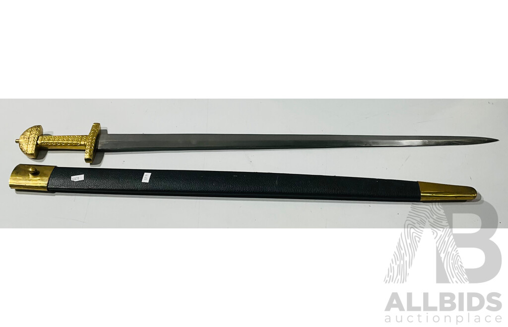 Sword with Decorative Brass Handle in Scabbard