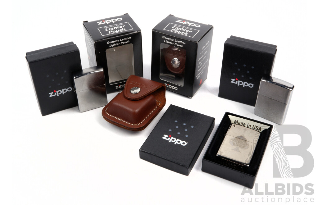 Collection of Three Boxed Zippo Lighters with Two Boxed Zippo Leather Pouches