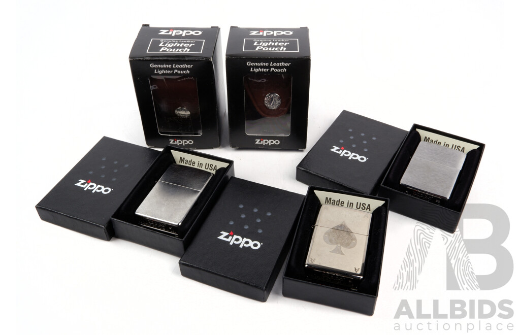 Collection of Three Boxed Zippo Lighters with Two Boxed Zippo Leather Pouches