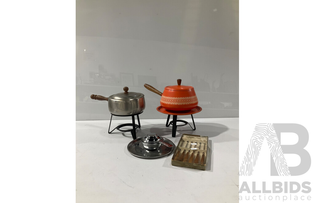 Orange Handled Fondue Pot with Stand Along with Another Fondue Set and Accessories Including Set Six Danish Fondue Forks in Original Box