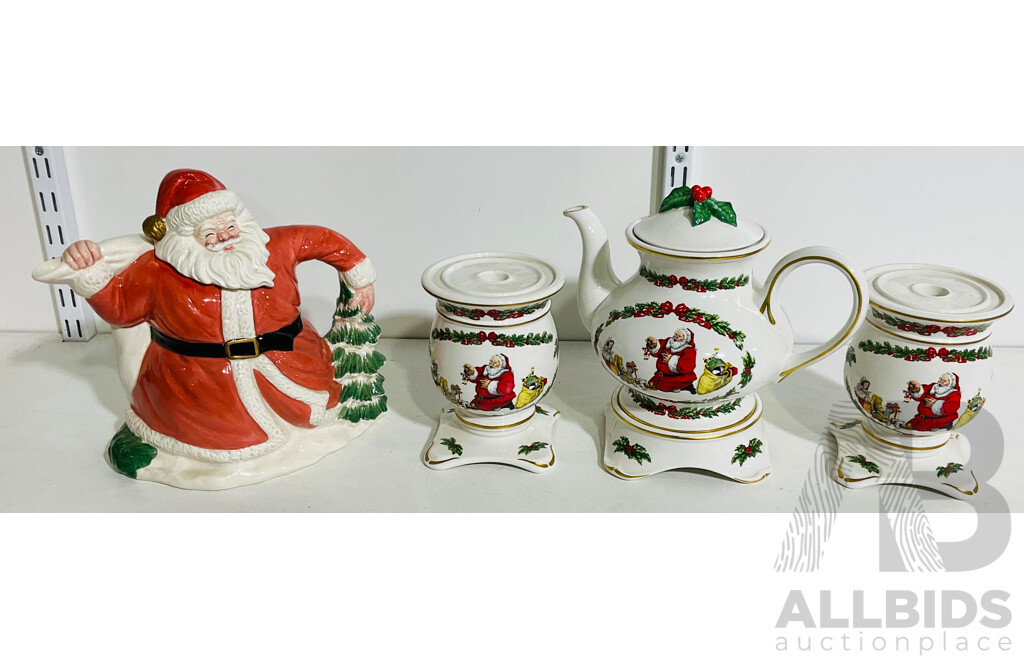 Collection of Decorative Christmas Crockery Including Two Teapots and Pair of Matching Candle Holders