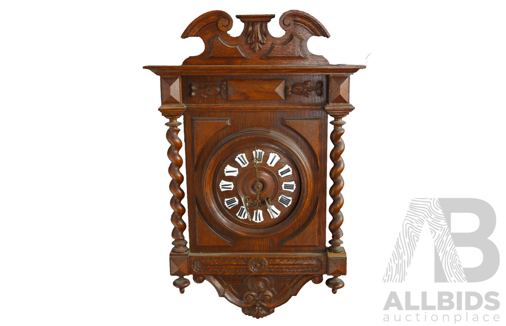 Oak Chiming Wall Clock with Barley Twist Sides, Enameled Roman Numerals and Ornate Carvings