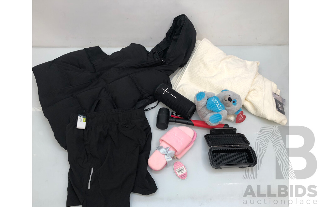 Assorted Lot of Items Ranging From Women's Clothes to Bath Towels to Speakers