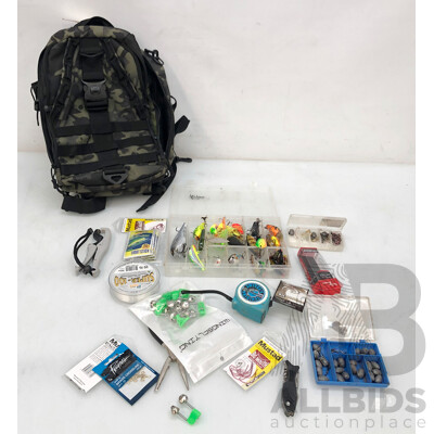 Camoflague Back Pack Filled with Fishing Lures, Line and Other Fishing Items + 'image'