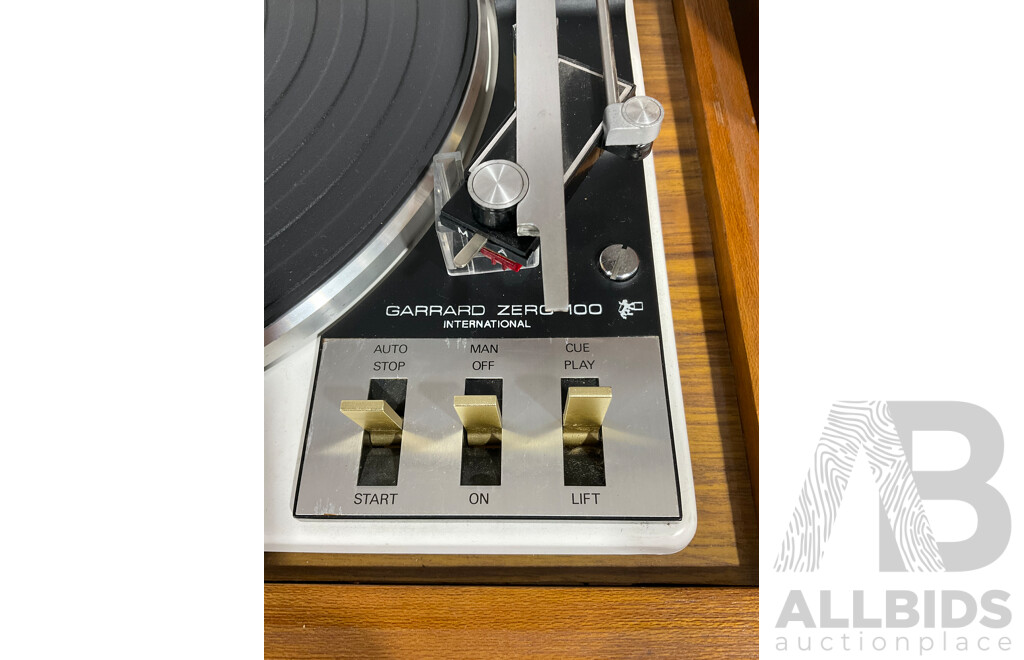 Vintage Garrard Zero 100 International Record Player Alongside Par of Wharfdale Speakers