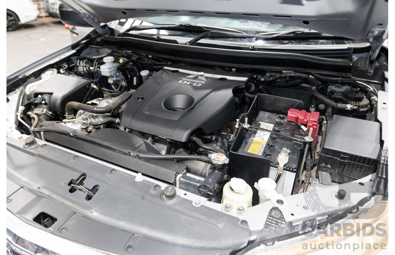 10/2015 Mitsubishi Triton GLX (4x4) MQ MY16 Dual Cab Utility Metallic Silver Turbo Diesel 2.4L