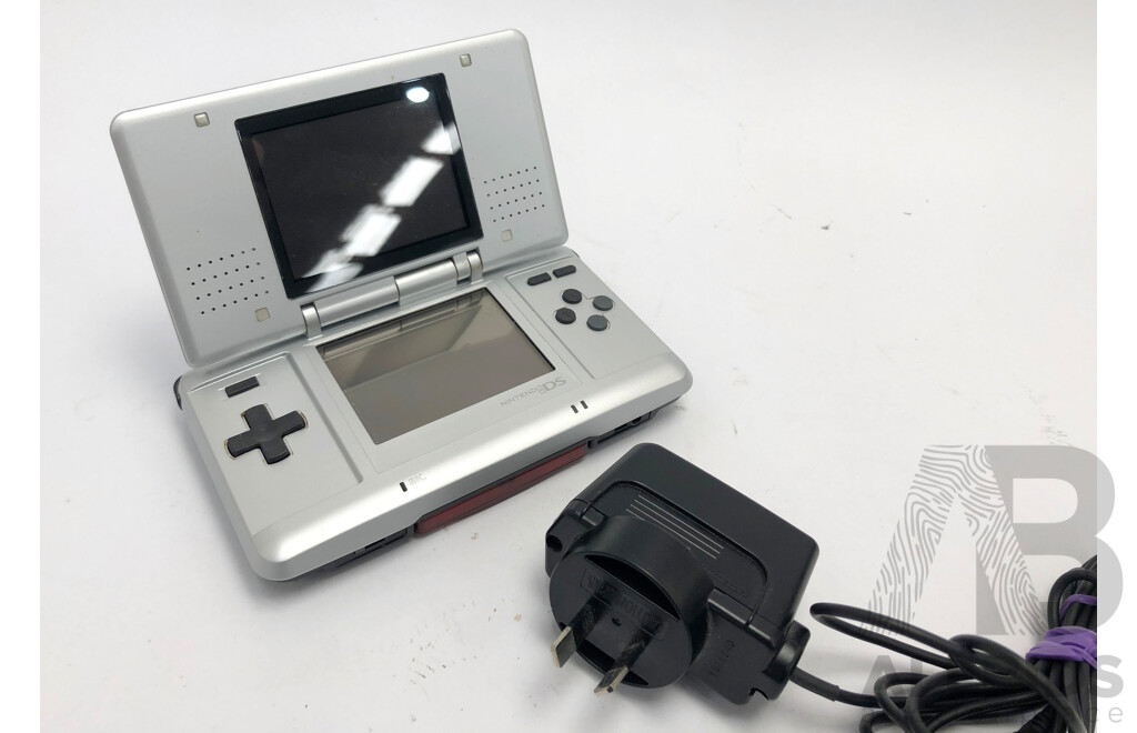 Silver Vintage Nintendo DS with Power Cord