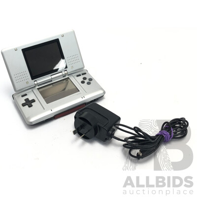 Silver Vintage Nintendo DS with Power Cord