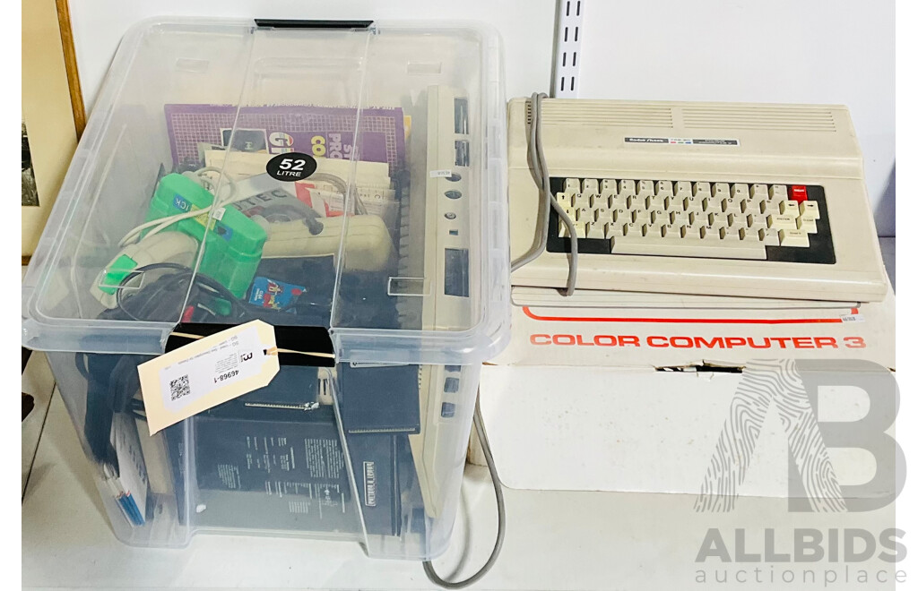 Large Quantity of Vintage Computer Equipment and Accessories Including a Commodore 64, Radio Shack and Tandy Colour Computer 3s, Discs, Controllers, Manuals and More