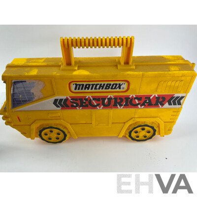 Vintage Matchbox Carry Cases Including Twenty Car Collector's Steering Wheel Case, Early 1980's Carry Case, Seuricar and Fire Truck Case