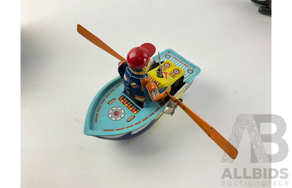 Three Vintage Pressed Steel Toys Including Rocket Racer, Clock Work Row Boat and Motorcycle with Original Boxes, Made in China