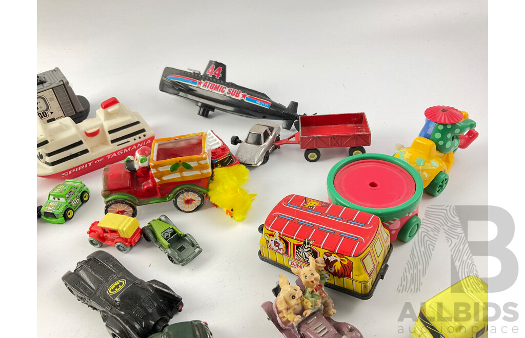 Collection of Diecast and Plastic Vehicles Including Matchbox Auto Cargo, Spirit of Tasmania, Cars, Trucks, Hovercrafts and More