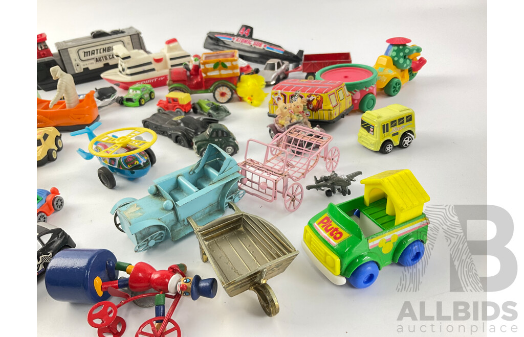 Collection of Diecast and Plastic Vehicles Including Matchbox Auto Cargo, Spirit of Tasmania, Cars, Trucks, Hovercrafts and More