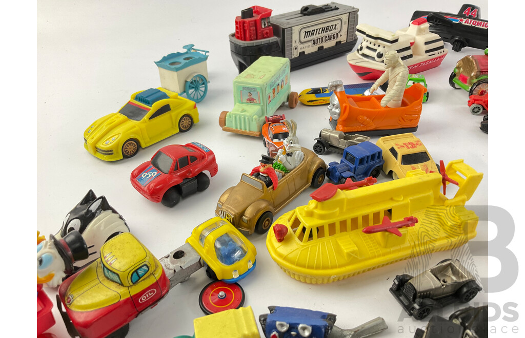 Collection of Diecast and Plastic Vehicles Including Matchbox Auto Cargo, Spirit of Tasmania, Cars, Trucks, Hovercrafts and More