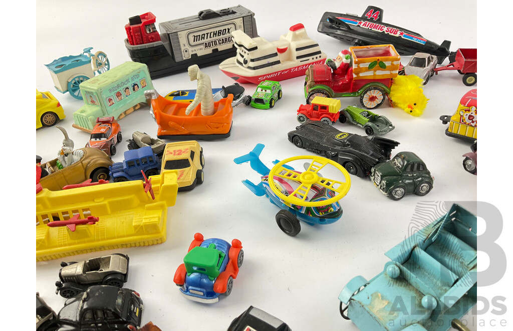 Collection of Diecast and Plastic Vehicles Including Matchbox Auto Cargo, Spirit of Tasmania, Cars, Trucks, Hovercrafts and More