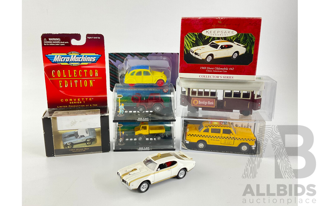 Collection of Boxed Diecast Vehicles Including Matchbox, Micro Machines, Hall Mark and Maisto