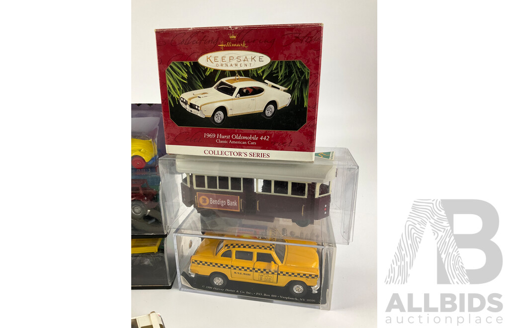 Collection of Boxed Diecast Vehicles Including Matchbox, Micro Machines, Hall Mark and Maisto