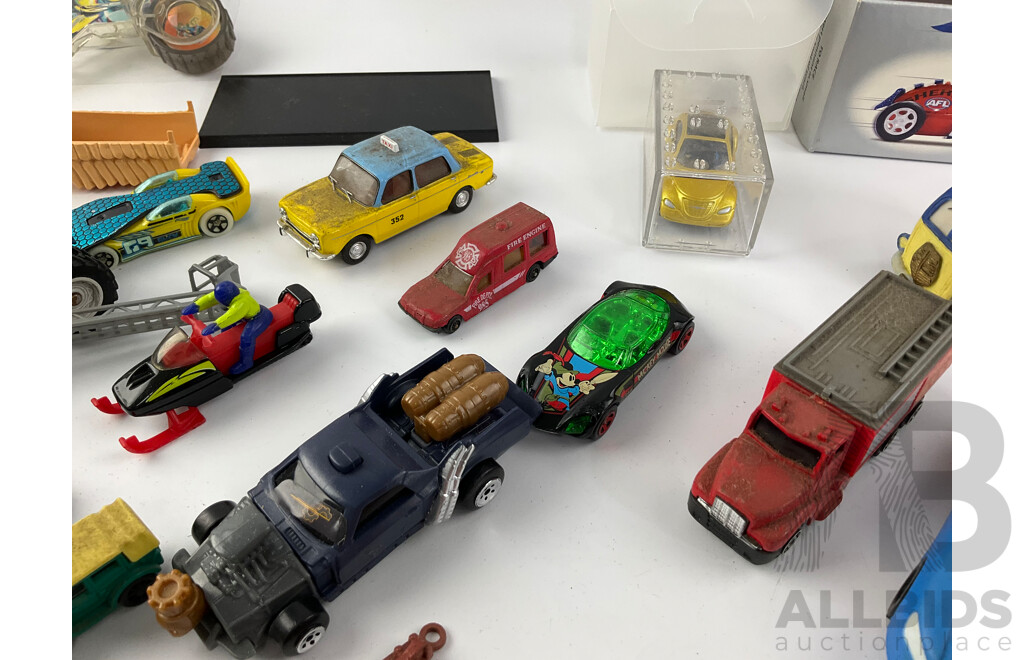 Collection of Diecast and Plastic Vehicles Including Matchbox, Burago, Maisto, Hotwheels and More