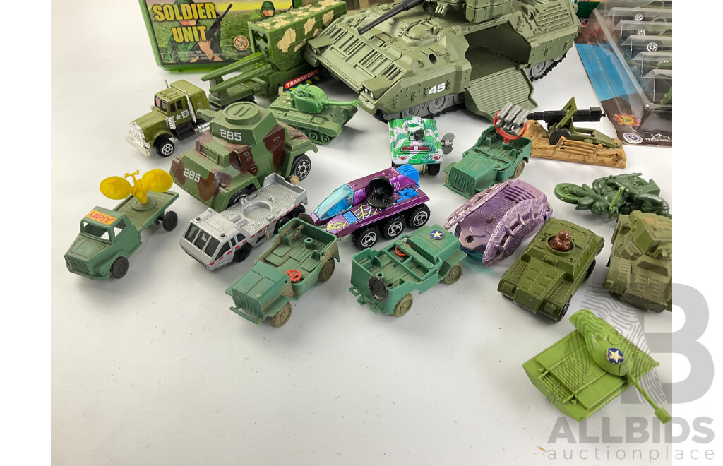 Collection of Boxed and Loose Military Vehicles Including Matchbox and Hot Wheels