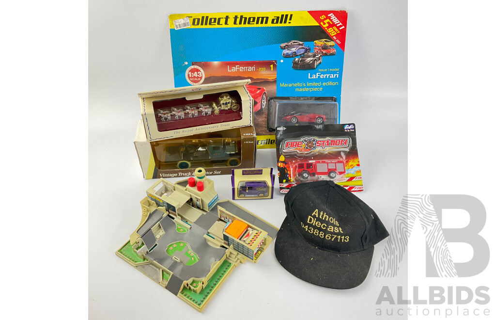 Collection of Boxed Diecast Vehicles Including 2013 La Ferrari, 1931 Hawk Eye Flatbed Truck, Cadbury Delivery Van and Firetruck