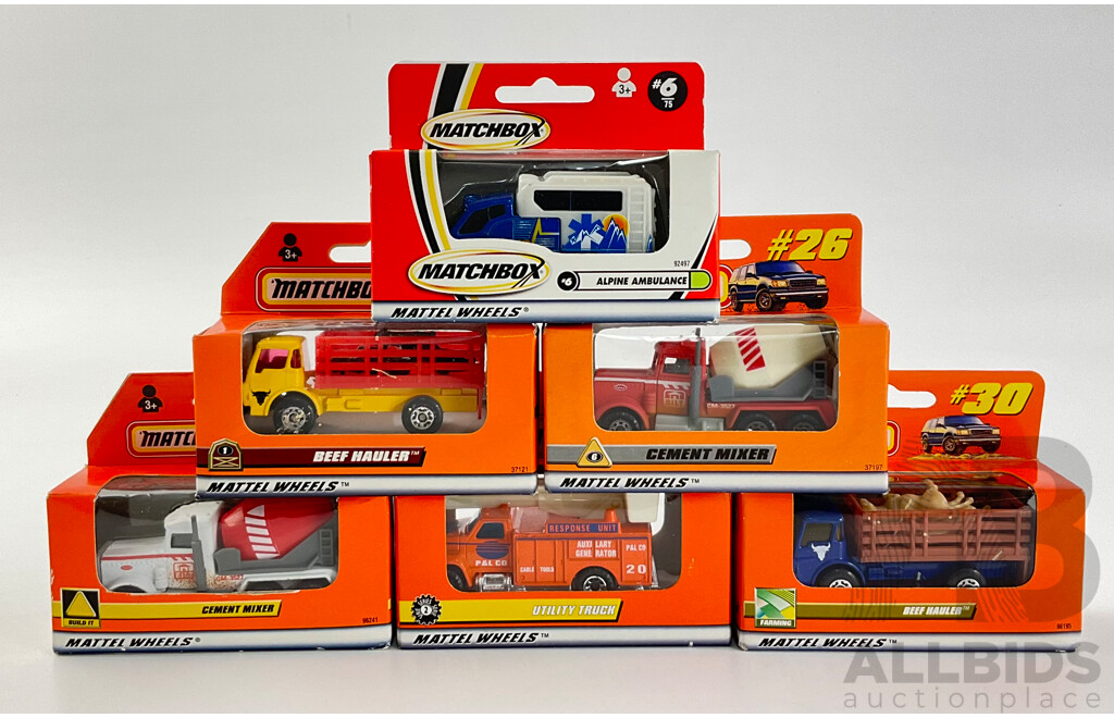 Six Boxed Matchbox Trucks Including Cement Mixer Beef Hauler Alpine Ambulance and Utility Truck