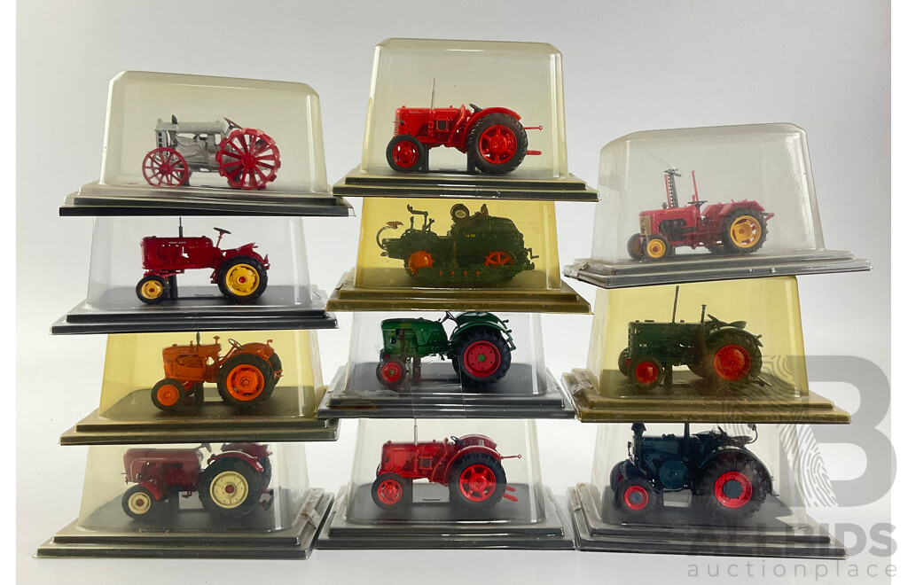 Collection of Cased Diecast Tractors Including Fordson, Massey-Harris, Fiat and More