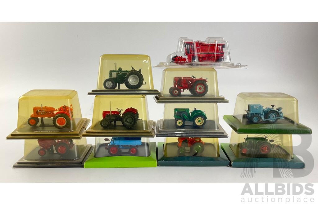 Collection of Cased Diecast Tractors Including Massey Ferguson, Allis-Chalmers, Case International and More